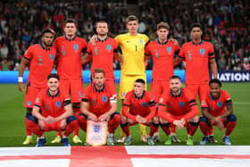 Footballers with England's men's team pose for a team photograph prior to the UEFA Nations League League A Group 3 match between England and Germany at Wembley Stadium on September 26. The Three Lions will be heading to the FIFA World Cup finals in Qatar in November 2022. (Photo by Shaun Botterill/Getty Images)