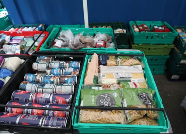 The Trussell Trust, which operates the UK's largest food bank network, says a "tsunami of need" is gripping the UK, as nationally, demand has outstripped donations for the first time.
