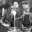 A 'gob' of glass being dropped into a bowl mould at Bagley's glassworks in the 1950s.