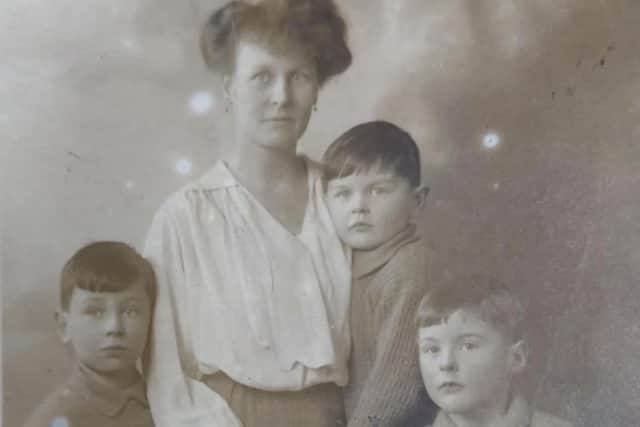 Gwendoline Beaumont (nee Haworth) 1918 taken at Hatfeild Hall with her three sons. Right Stephen, Left sitting Christopher. At her shoulder, Robert.