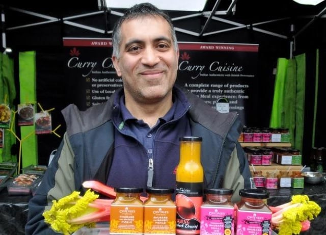 Paresh Tejura with a selection of rhubarb and mango pickle, Yorkshire rhubarb chilli jam and rhubarb dressing at his Curry Cuisine stall at the Wakefield Food, Drink and Rhubarb Festival in 2011.