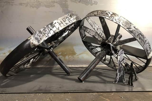 A 1:10 scale model of a sculpture be installed in Featherstone to celebrate the town's proud mining heritage. The 2.5 tonne piece of art, called The Unbroken Wheel, will go on permanent next to Wakefield Road.