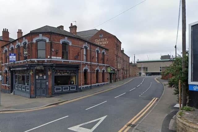 A driver noticed one of the men carrying a gun outside Henry Boon's in Wakefield. (pic by Google Maps)