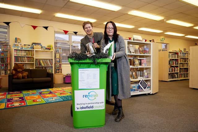 Cllr Jack Hemingway and Robyn Downs from Renewi promoting the recycling banks for small electrical items that have been placed in libraries around the Wakefield district. Pictured in Stanley library.