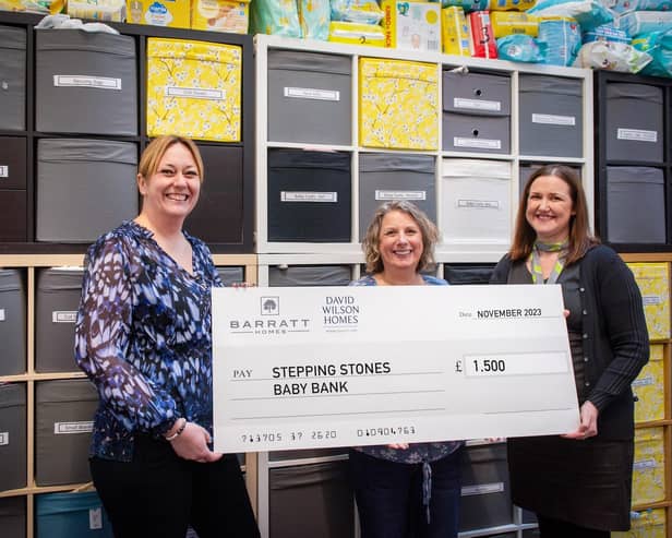 Stepping Stones Baby Bank with the donation from Barratt Developments. The £1,500 donation is part of the company's monthly Community Fund initiative