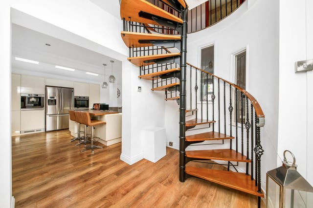 A cast iron spiral staircase features in the property's inner vestibule.