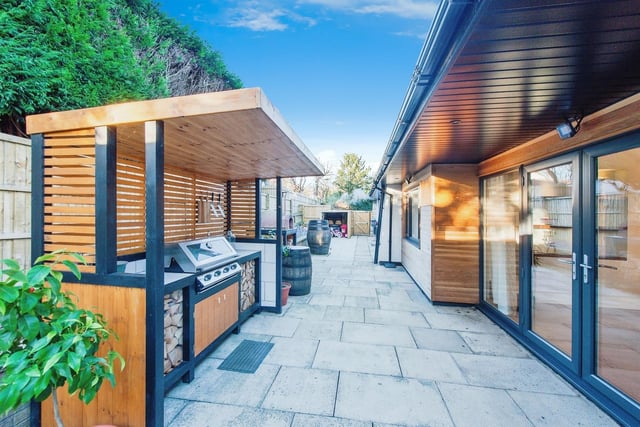 The outdoor cooking station  and entertaining space is great for summer.