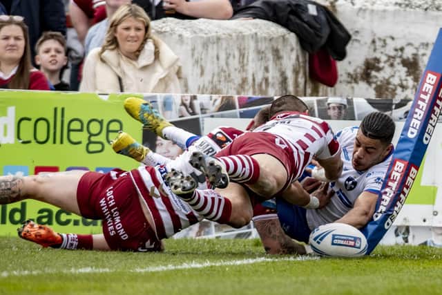 Wakefield Trinity's Lewis Murphy scores a trademark spectacular try in the 2022 season and will be looking to kick on in the 2023 campaign. Picture: Tony Johnson