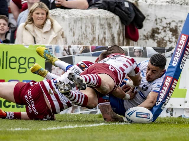 Wakefield Trinity's Lewis Murphy scores a trademark spectacular try in the 2022 season and will be looking to kick on in the 2023 campaign. Picture: Tony Johnson
