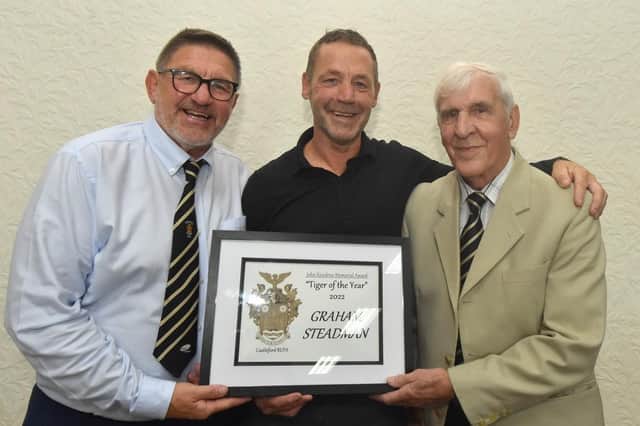 Chairman Barry Johnson and Alan Hardisty present Graham Steadman with the Tiger of the Year award.
