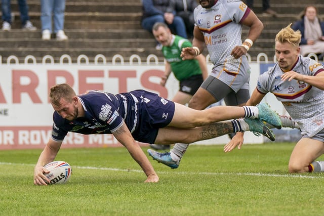 Josh Hardcastle produces a flying finish for a try. Picture: Dec Hayes