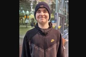 Jacob was last seen wearing the clothing in this image - a dark Nike tracksuit with Nike trainers and a blue Paul and Shark beanie hat.
