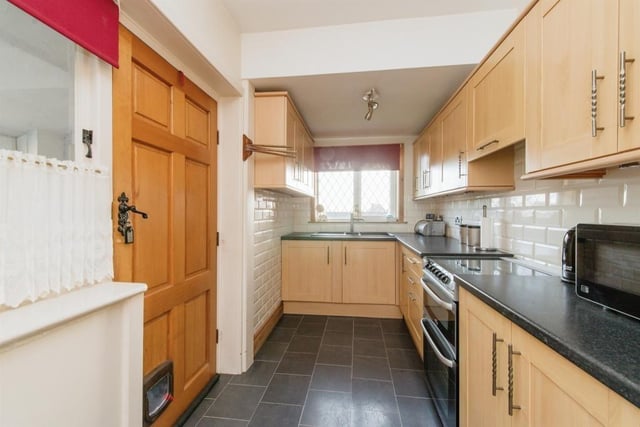 A well equipped kitchen with a gas cooker, a washing machine and fridge freezer included.