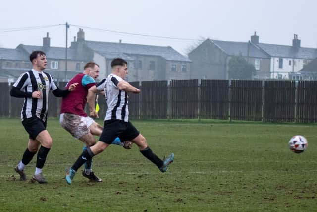 James Walshaw fires Emley two up against Whickham. Picture: Mark Parsons
