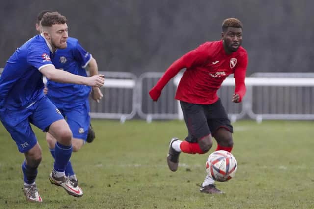 Benjamin Agu on the attack for Horbury Town in their game against Brigg Town.