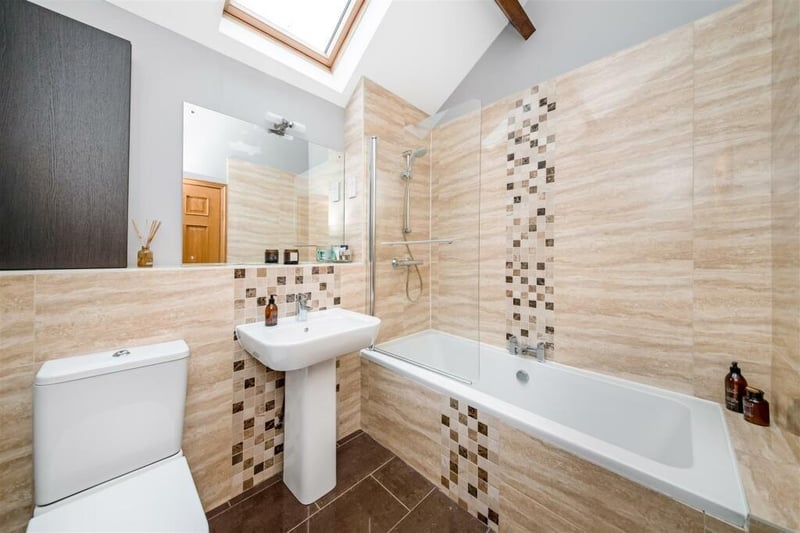 One of three bath and shower rooms, two of which are en suite facilities.