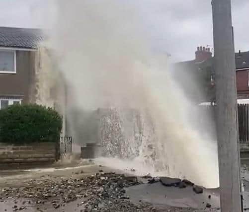 The burst water main caused 'serious' water damage to a nearby house.