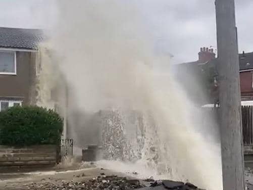 The burst water main caused 'serious' water damage to a nearby house.