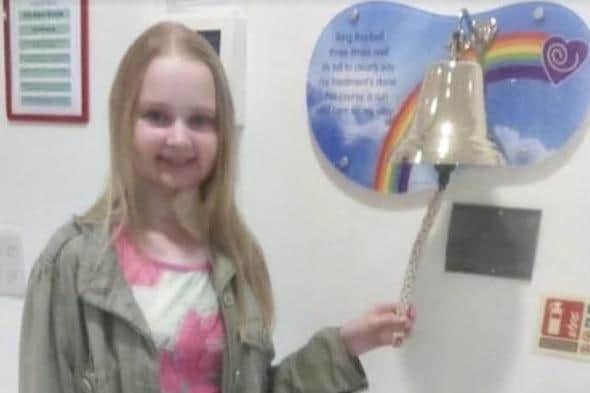 Kimberley Ringing the End of Treatment Bell in 2016 for second cancer.
