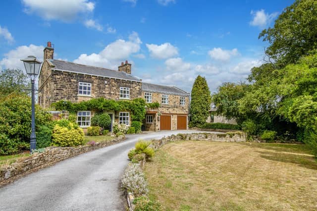 The leafy approach to the Grade ll-listed property for sale in Sharlston Common.