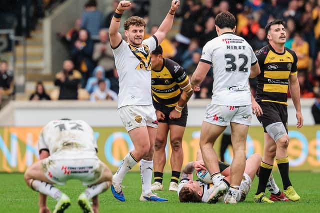 Castleford Tigers' George Lawler celebrates the win at York Knights. Picture by Alex Whitehead/SWpix.com