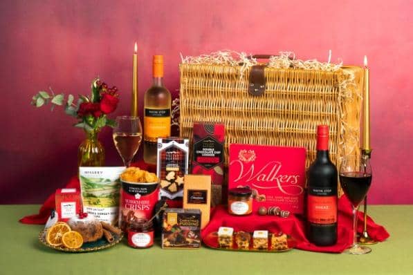The Luxury Gift Basket, priced at £95, which includes fine wine, biscuits, handmade mini cakes.