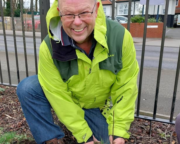 Len Richards, Chief Executive at Mid Yorkshire Teaching NHS Trust, helping to plant some of the 4,000 tree whips on the Pinderfields Hospital site during March.