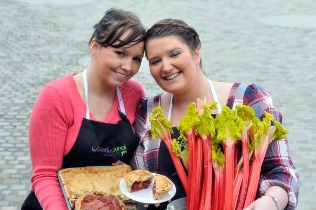 Emily Whylde 18 (left) and Rebecca Baldwin 19, apprentices with Wakefield Metropolitan District Council, who were busy making making rhubarb pies at the Food, Drink and Rhubarb Festival in Wakefield precinct in 2011.