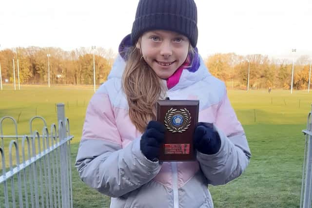 Sienna Lavine clinched the West Yorkshire Cross Country League title in the U11 girls age section with victory in the final round of the series.