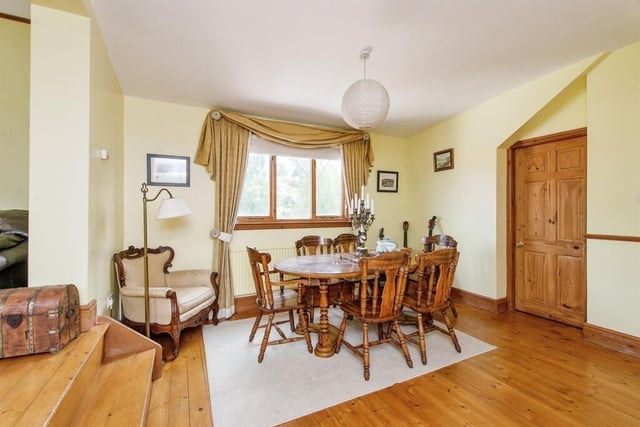 The dining room includes a solid wooden floor, double glazed window to the rear, gas central heating radiator, pitched sloping access into the study and open plan access into the living room.