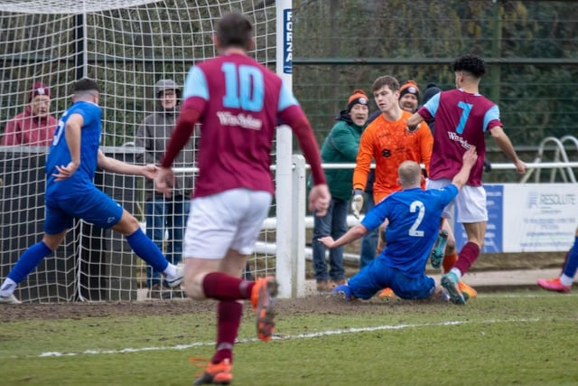 Junayd Cassius-Gill nets Emley's second goal.