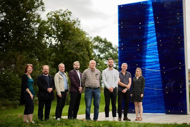 The Ever Glow Sculpture, pictured left to right: Kate Watson, Principal Consultant at Beam, Tristram Hope, Structural Engineer, Ross Fullwood, Contractor,  Kieran Gelder, Project Manager, Coun Stuart Heptinstall, Coun Michael Graham, Graeme Mitcheson, arrtist and poet,  Laura Potts.
