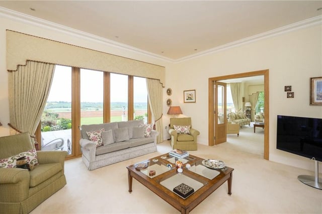 From numerous rooms in the property, panoramic views over the adjoining open countryside are available.