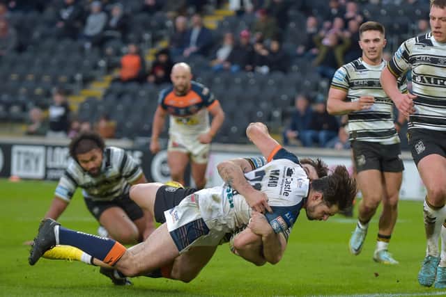 Jake Mamo scores a late try for Castleford Tigers as they almost pulled off an amazing comeback at Hull. Picture: Craig Cresswell Photography
