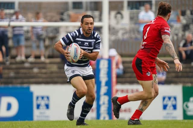 Mark Kheirallah runs the ball in his first game back for Featherstone Rovers after a long term injury-lay-off. Picture: JLH Photography