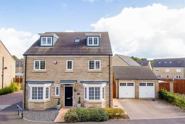 The three-storey former show home for sale in Newmillerdam.