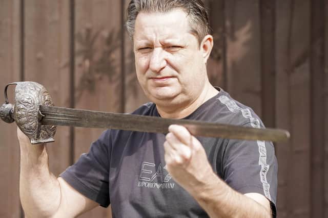 Andrew Green claims to own a sword that belonged to King Charles i and King Charles II. Picture Scott Merrylees