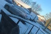 Savannah Kaye sent in this picture of cars covered in snow.