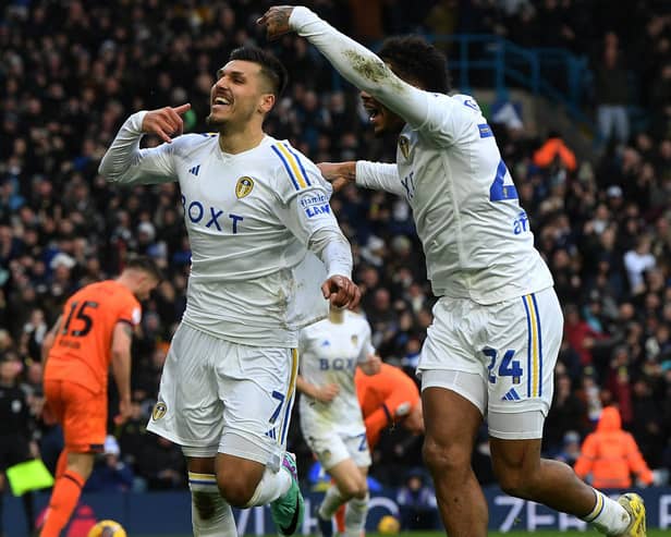 Joel Piroe celebrates scoring Leeds United's fourth goal against Ipswich Town with teammate Georginio Rutter.