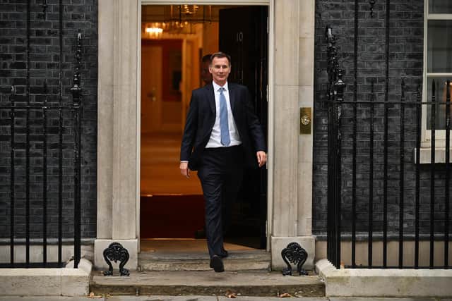 New UK Chancellor Jeremy Hunt leaves 10 Downing Street on October 14. Photo by Leon Neal/Getty Images.
