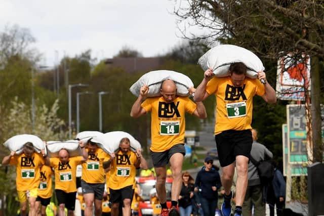 Gawthorpe will once again host the prestigious World Coal Carrying Championships on Easter Monday (April 1) - where runners carry coal sacks over a distance of 1.1km. The event is split into thrree races: the men's, women's and children's.