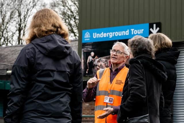 Colin Harrison, one of the museum's volunteers, conducting a tour. Colin said one of the important parts of being a volunteer is having discussions with visitors about their mining experiences. Picture: NCMME