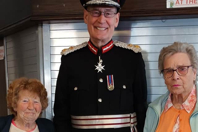 Lord Lieutenant of West Yorkshire Ed Anderson with volunteers from the Senior Citizens Support Group.