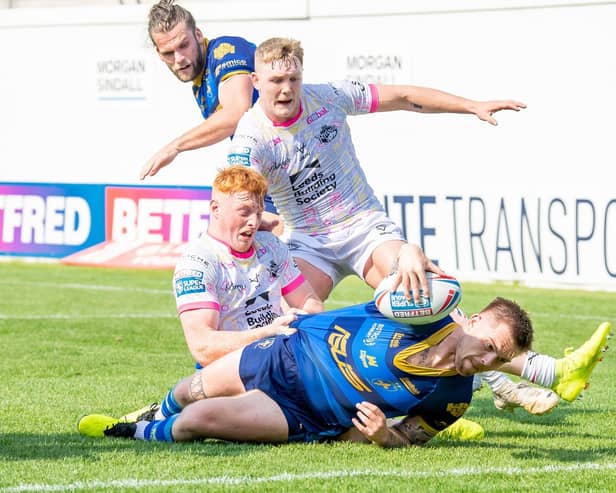 Morgan Smith is ready to reach out and score Wakefield Trinity's winning try against Leeds Rhinos. Picture: Allan McKenzie/SWpix.com