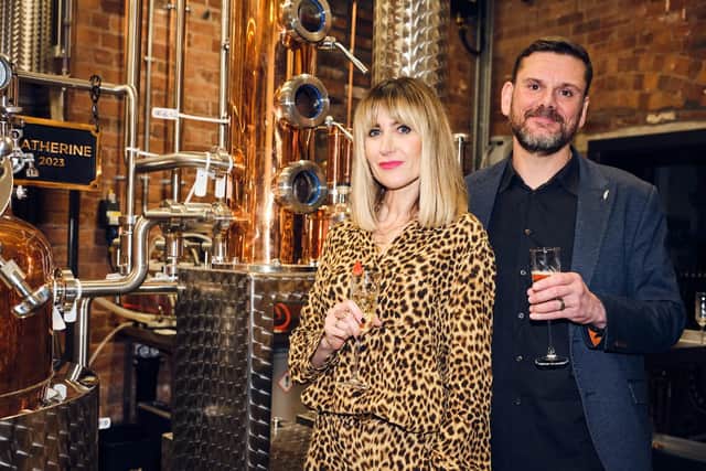 Katherine Kelly withoOwner and head distiller, Gary Ford.