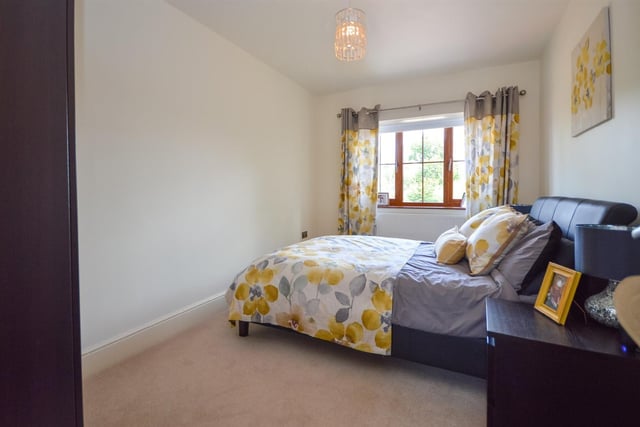 Another of the double bedrooms within the Ossett property.