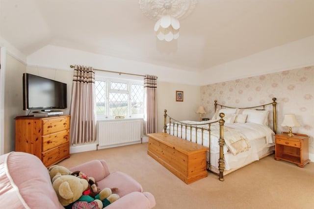 One of the spacious double bedrooms within the house.