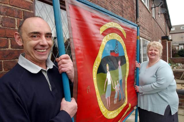 Bob and Janet Oldfield, of Feathestone, with their Featherston Miners' Wives banner from the 1984 miners' strike. February 12, 2004.