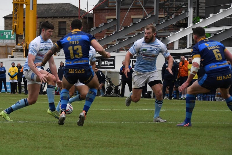 Riley Dean puts a kick in to set up a try for Featherstone Rovers.