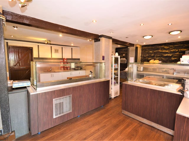 Currently used as a shop, this area could also suit a variety of purposes.